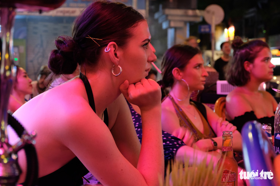 Women watch the England-Belgium match at the 2018 FIFA World Cup in Ho Chi Minh City, Vietnam, June 29, 2018. Photo: Tuoi Tre