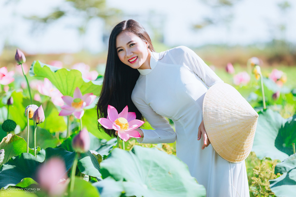 Palm-leaf conical hats and Ao Dai make up the traditional Vietnamese costume