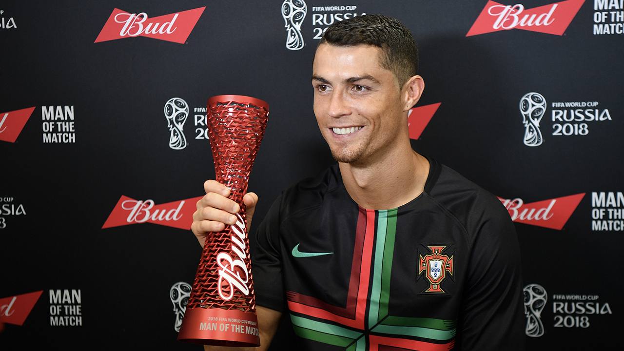Portuguese player Cristiano Ronaldo poses with his Man of the Match trophy after he scored the only goal during the 2018 FIFA World Cup Group B match between Portugal and Morocco. Photo: Reuters