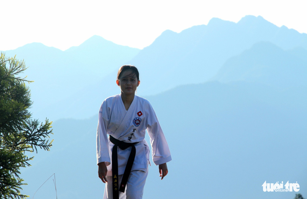 A female karate student runs in the Bach Ma (‘White Horse’) Mountain in Thua Thien-Hue Province, Vietnam. Photo: Tuoi Tre