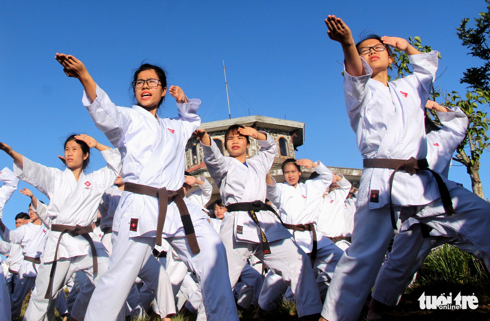Female karate students practice in the Bach Ma (‘White Horse’) Mountain in Thua Thien-Hue Province, Vietnam. Photo: Tuoi Tre