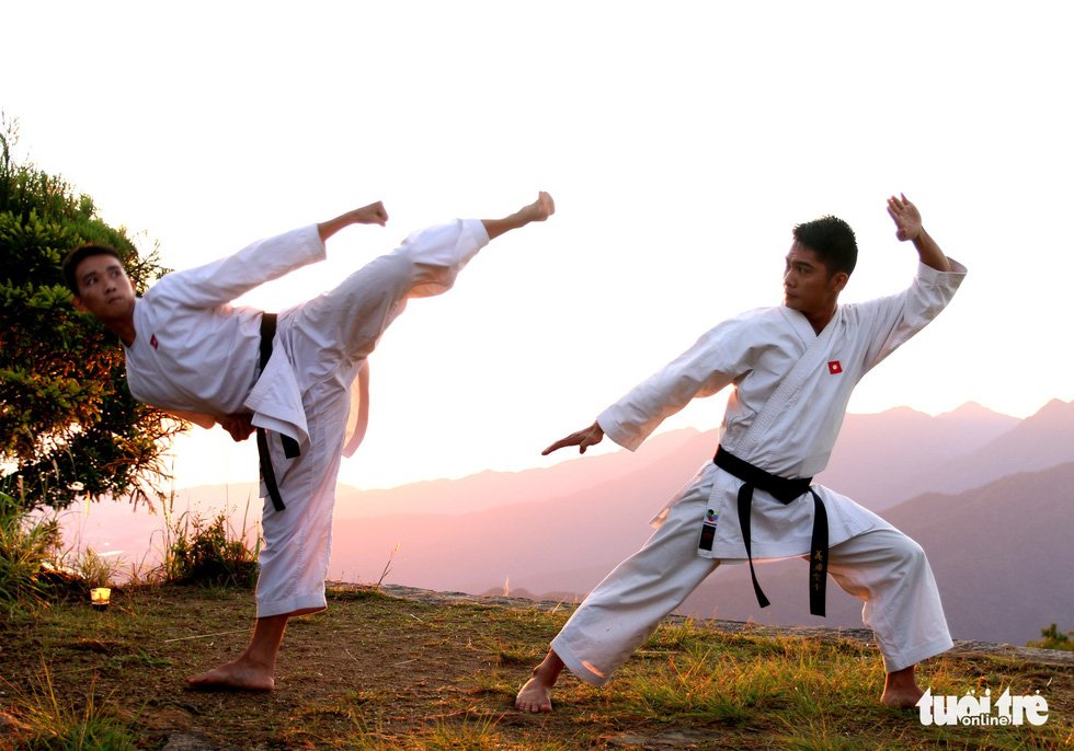Two karate students perform in the Bach Ma (‘White Horse’) Mountain in Thua Thien-Hue Province, Vietnam. Photo: Tuoi Tre