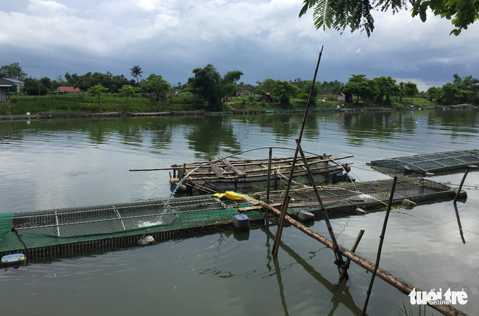Fish-farming cages are seen in the Bo River in Thua Thien-Hue Province, Vietnam, July 10, 2018. Photo: Tuoi Tre
