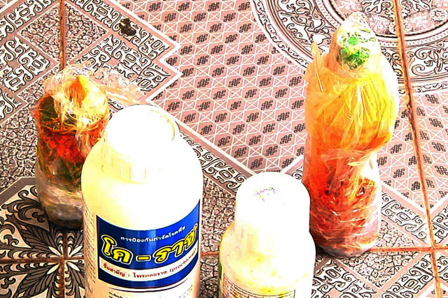 Bottles of chemicals lie on the floor at a fruit storage facility in Dong Nai, Vietnam. Photo: Tuoi Tre