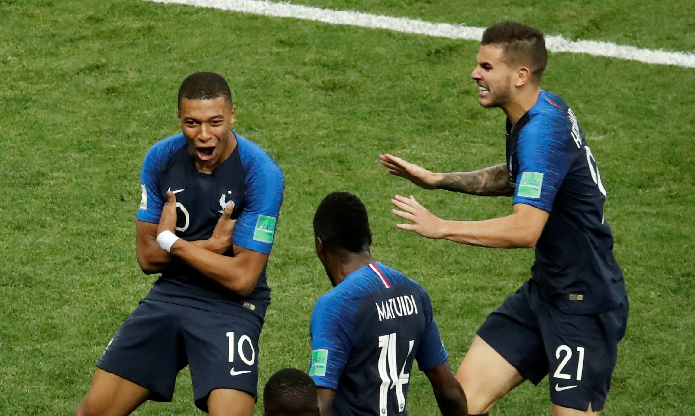 France's Kylian Mbappe celebrates scoring their fourth goal with team mates . Photo: Reuters