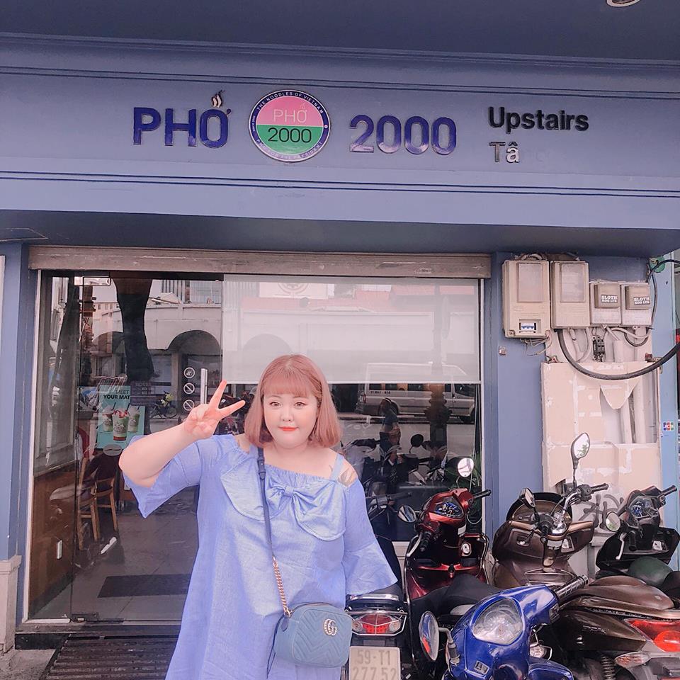 Yang Soobin poses in front of a pho store in Ho Chi Minh City in this photo posted on her Facebook.