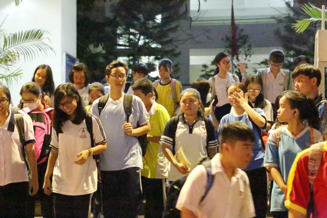 Students walk out from a tutoring center in Ho Chi Minh City. Photo: Tuoi Tre