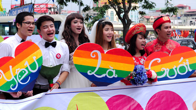 LGBT parades in wedding costume for same-sex marriage