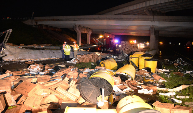 A destroyed truck being blown off the 40 freeway is pictured with its damaged cargo after a tornado swept through Shawnee, in Oklahoma May 19, 2013.