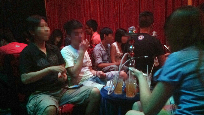 At tea shops, youths not only drink but smoke Shisha