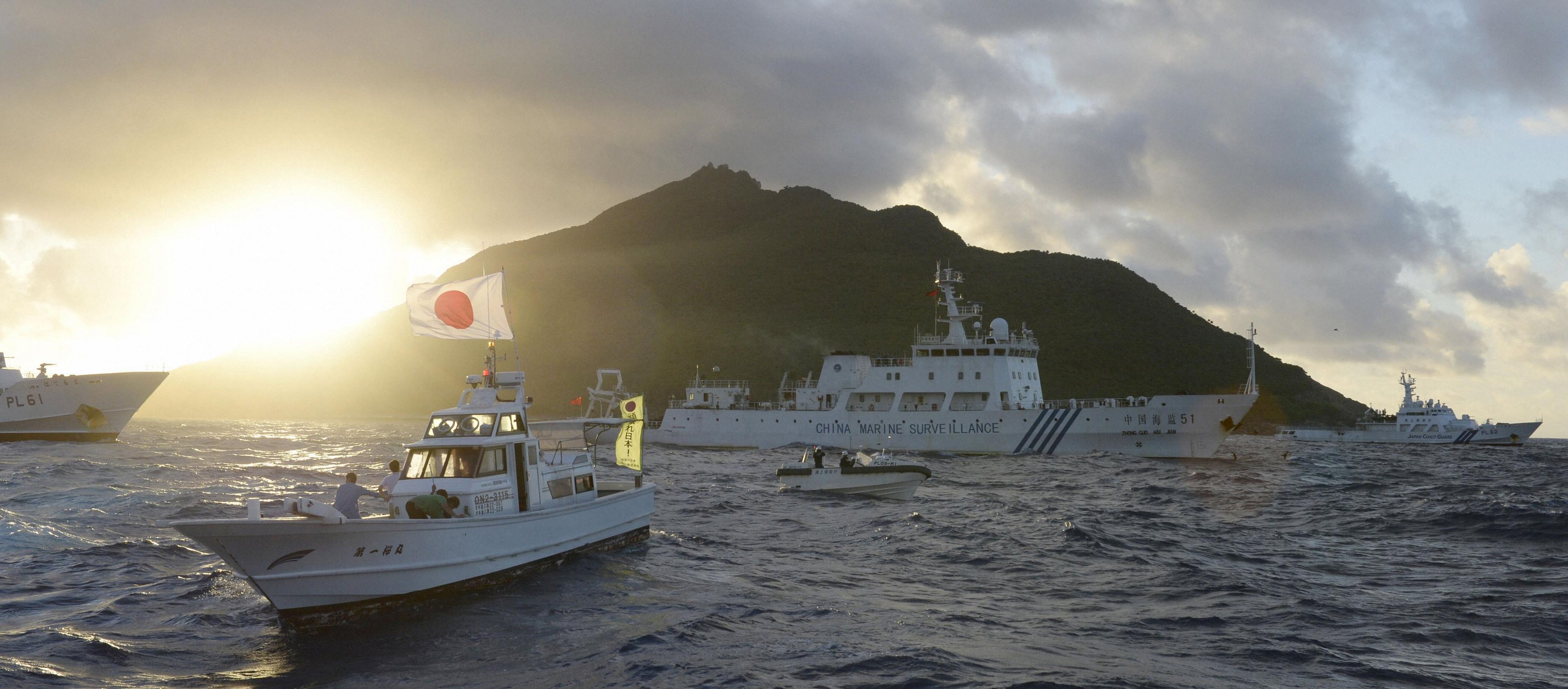 Japan says faces increasing threats from China, North Korea