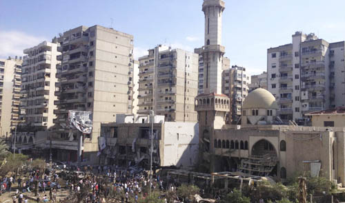 Blasts kill 27 outside two mosques in Lebanon