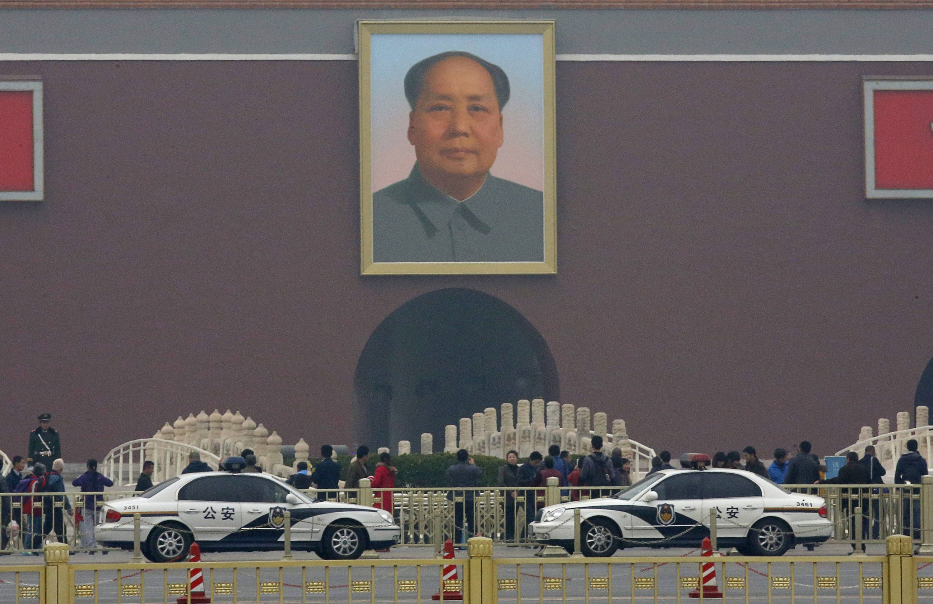 China Xinjiang military boss booted off ruling council after attack