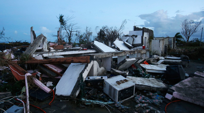 U.S. Filipinos pray, seek word from loved ones in wake of deadly typhoon