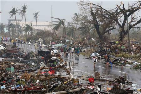 Survivors 'walk like zombies' after Philippine typhoon kills estimated 10,000