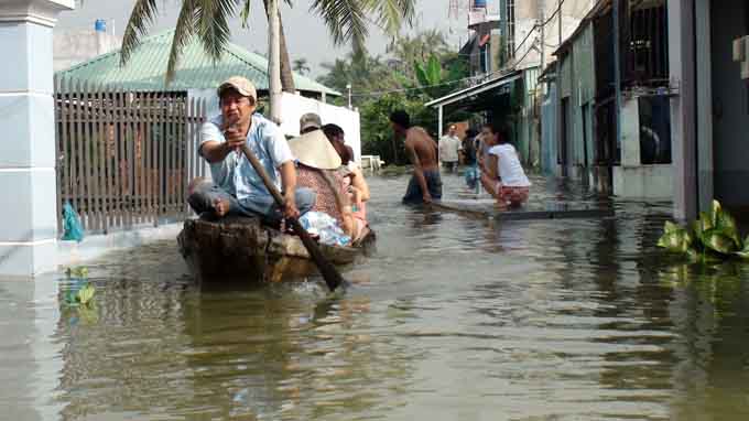 HCM City suffers flooding caused by high river water