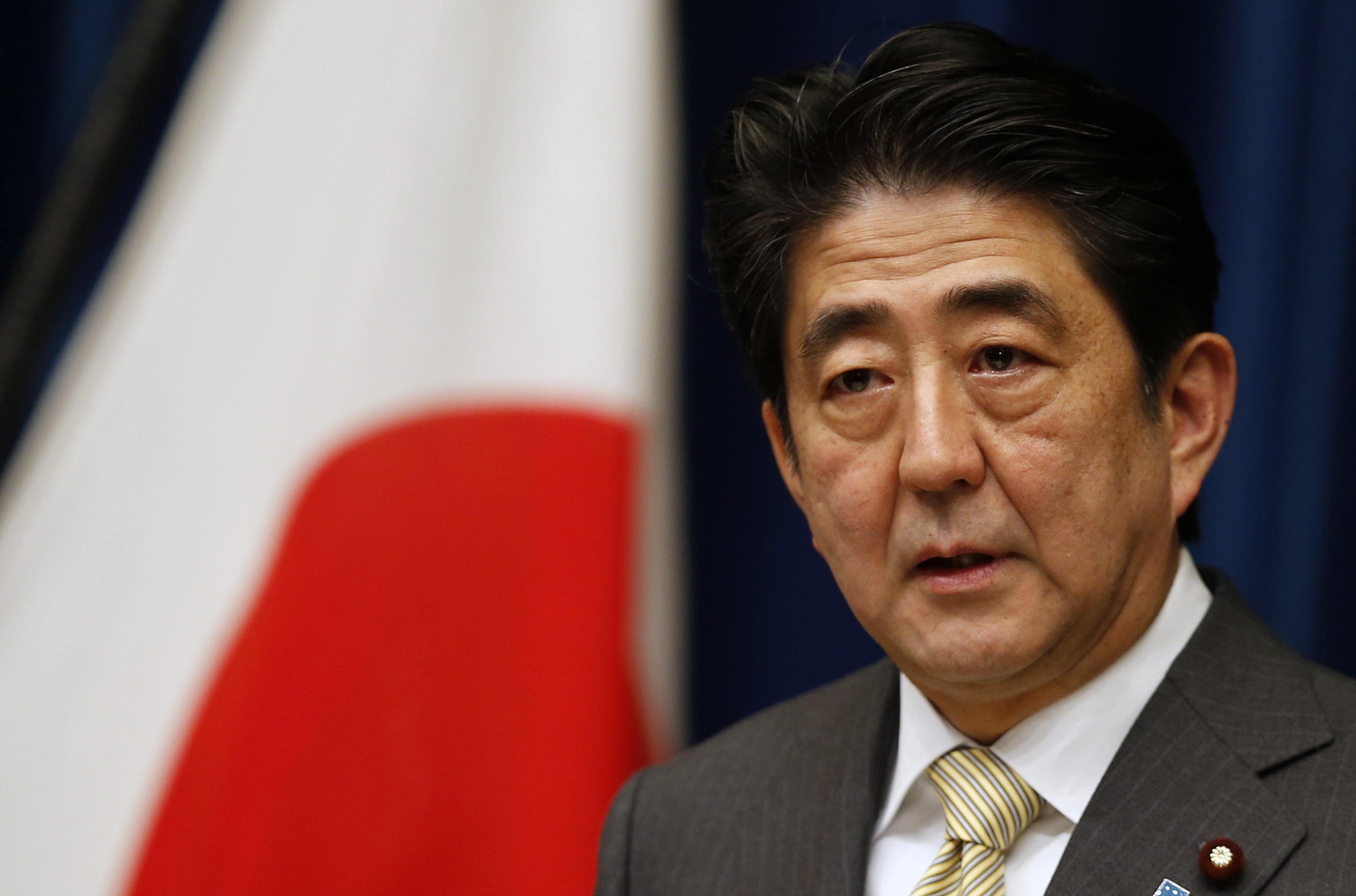 Japan PM Abe's ratings slide after state secrets act