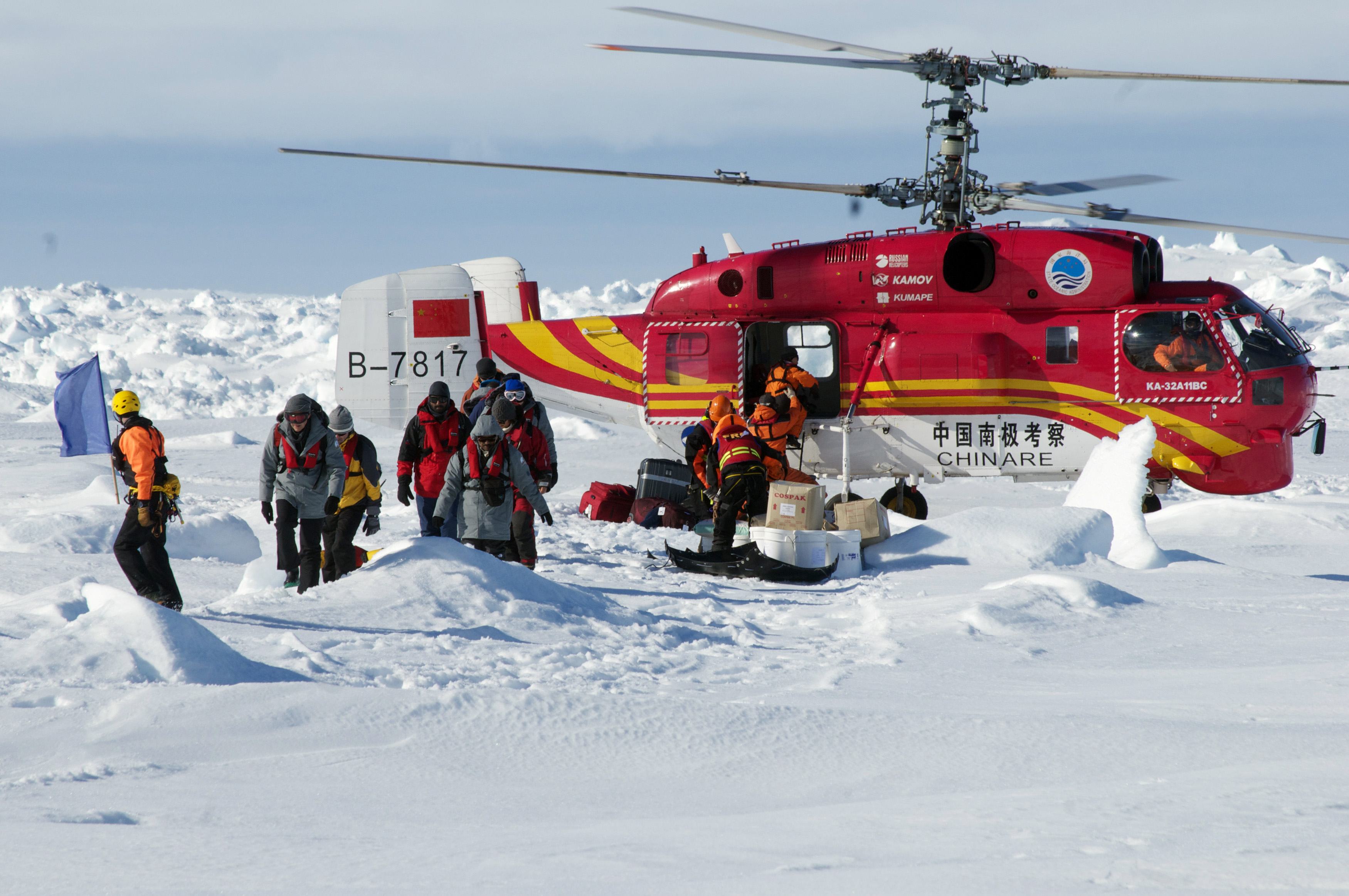 Scientists, tourists rescued from Antarctic ship begin long journey home