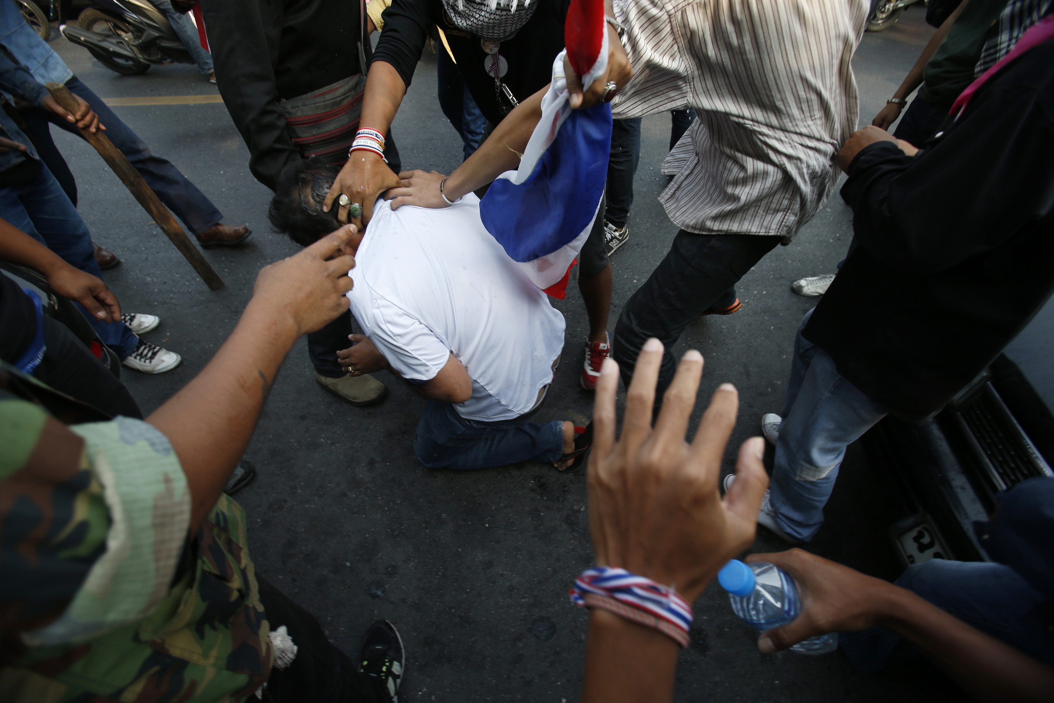 Thai protesters surround polling stations as advance voting begins