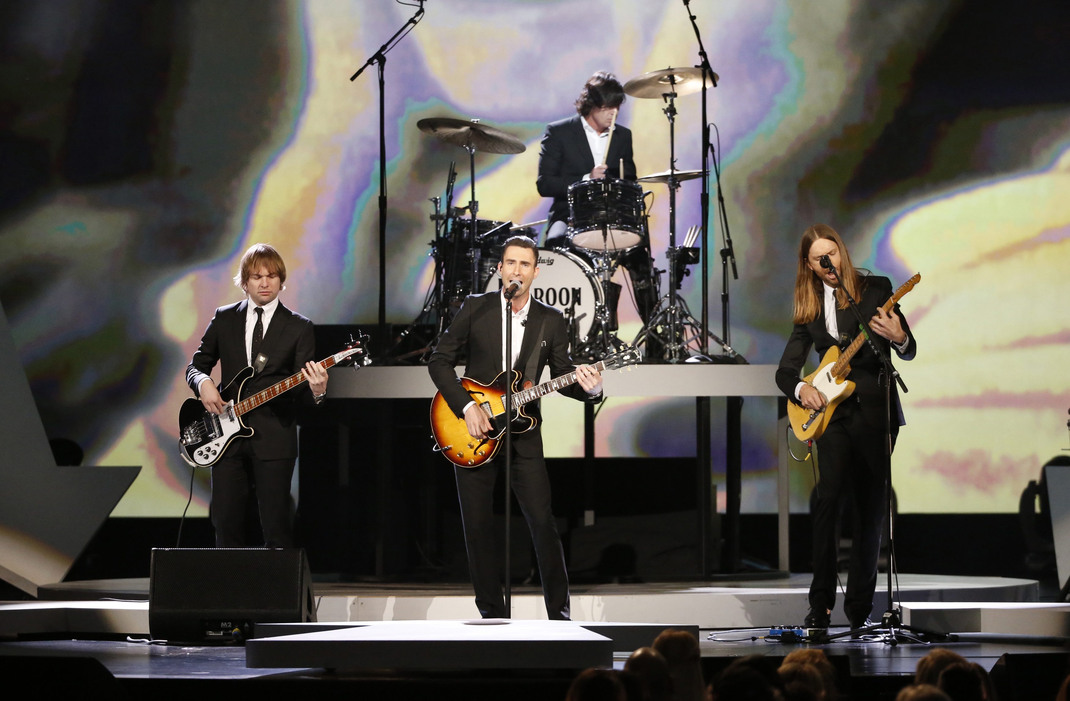 Beatles, mass wedding attract big TV audience to Grammys