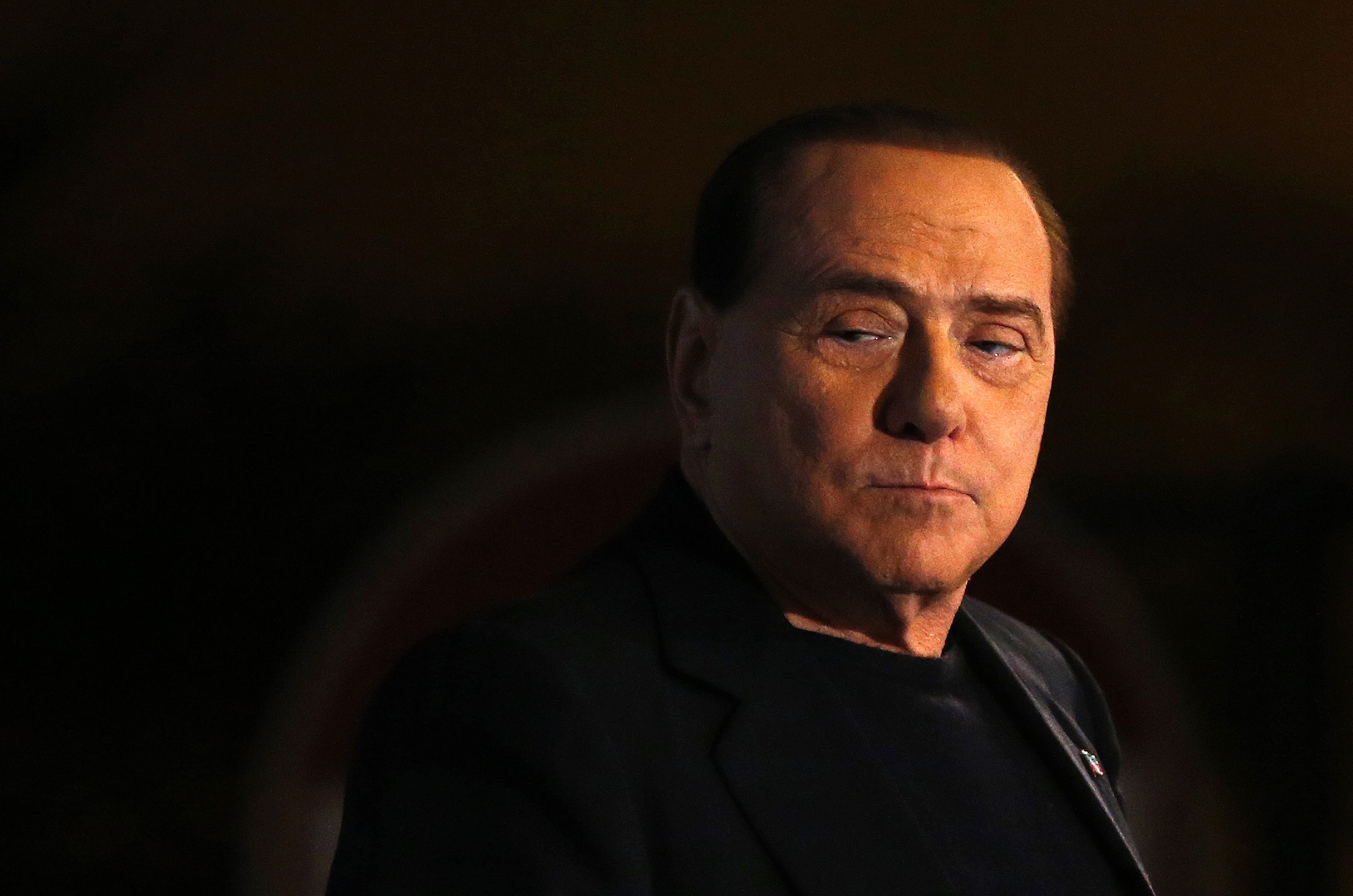 Berlusconi back in court for bribery in new trial