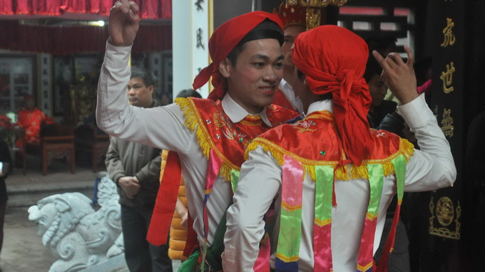 Men dressed as girls in northern traditional dance