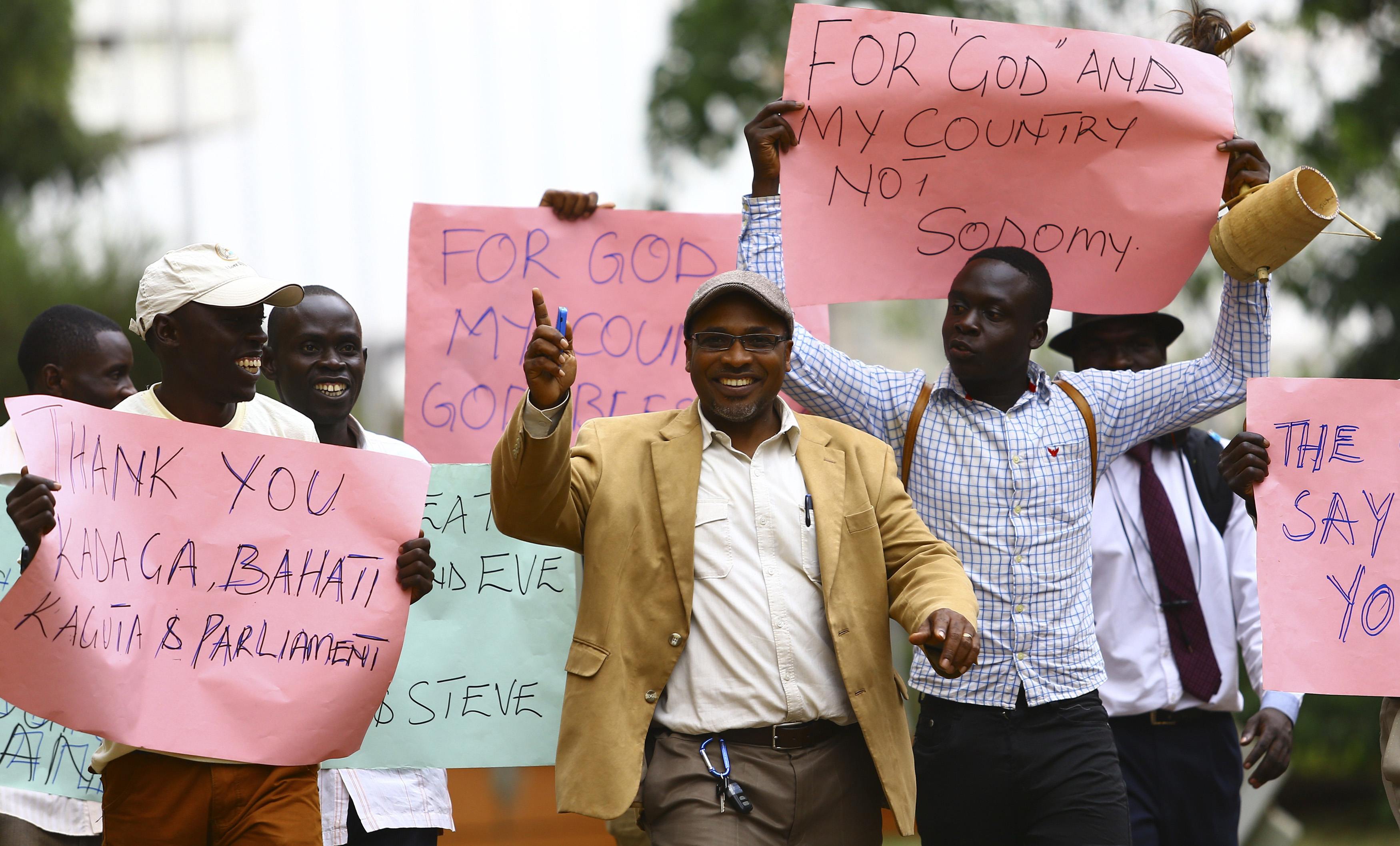 Ugandan president signs anti-gay bill, defying the West