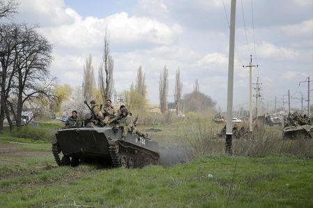 Separatists fly Russian flag over Ukrainian armoured vehicles