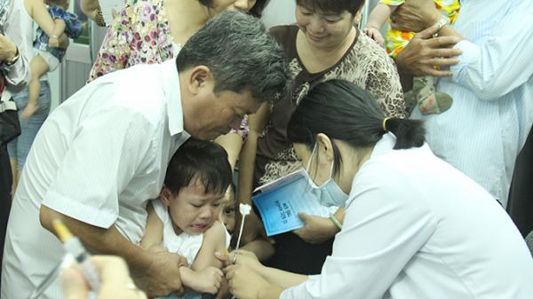 Vietnam parents take infants abroad for vaccination given local drug shortage