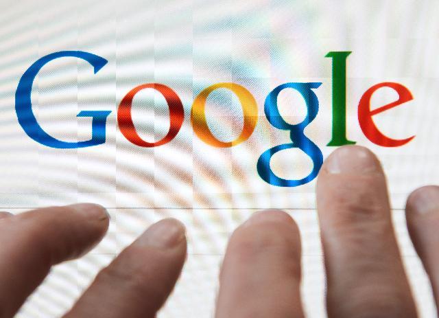 Google profit up as chief business officer steps out