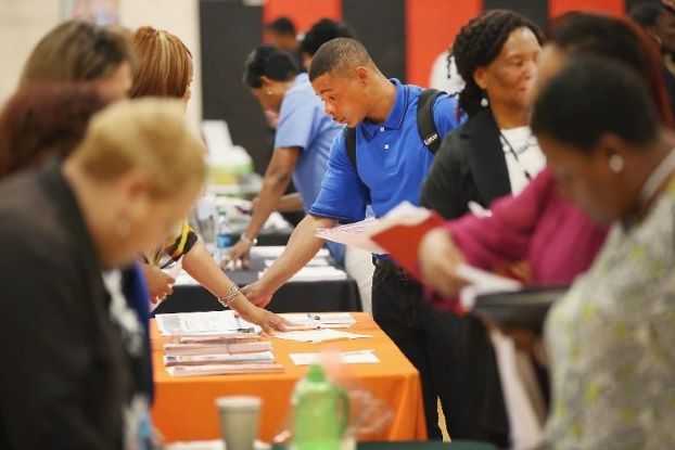 US jobs machine revs up, cutting unemployment to 6.1%