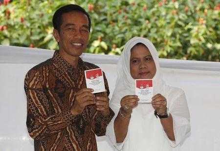 Both candidates in Indonesia election claim victory; Jokowi ahead in more counts
