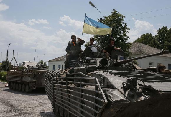 Russia threatens Ukraine after shell crosses border