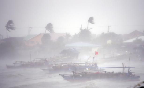 Typhoon kills at least 20 in the Philippines, heads towards China