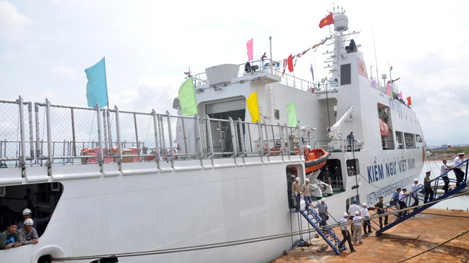 Vietnam’s ships go ashore after China moves rig out of Vietnamese waters