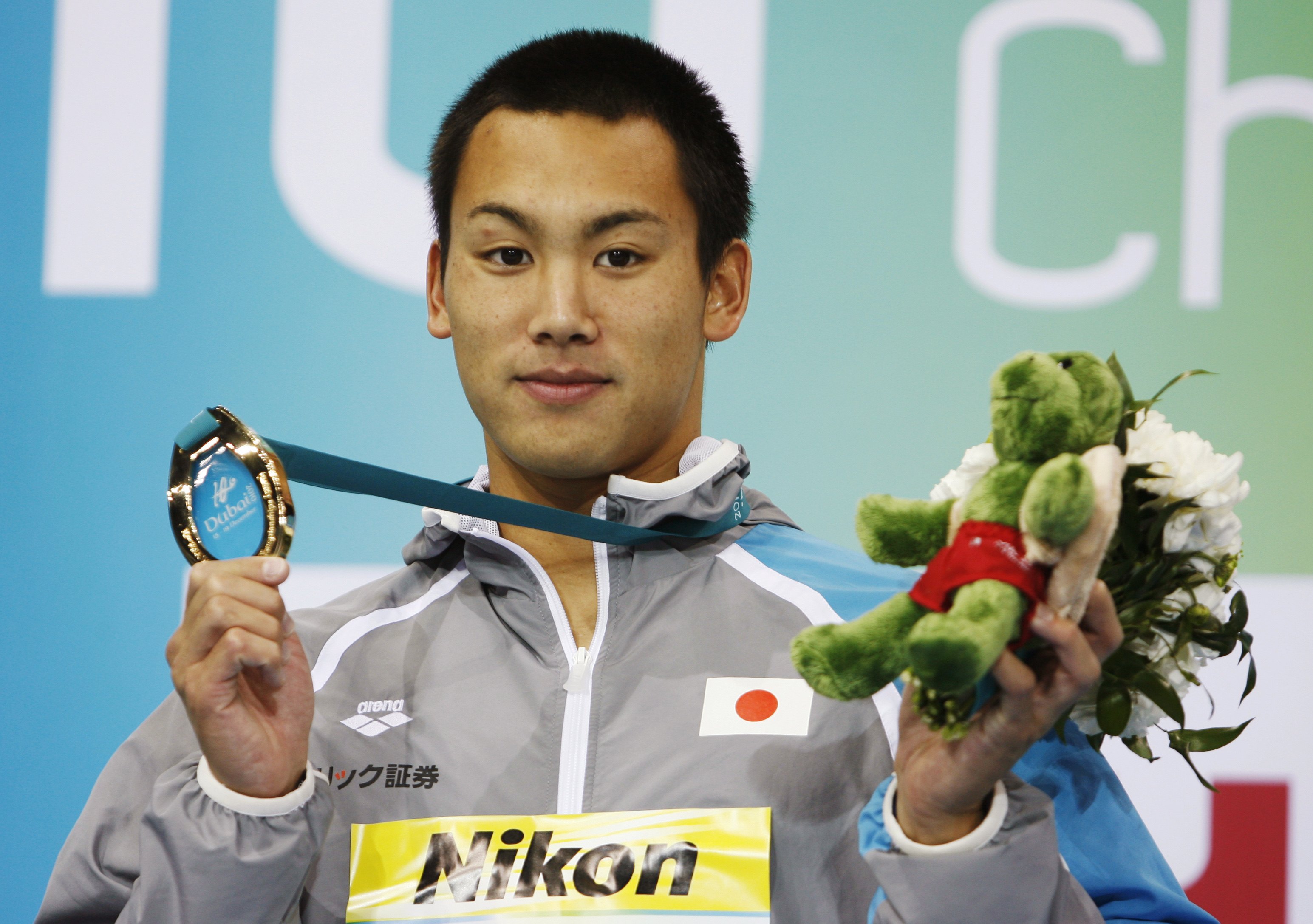 Japanese swimmer charged with stealing camera at Asiad