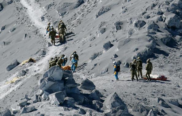 At least 36 feared dead on Japanese volcano, search called off