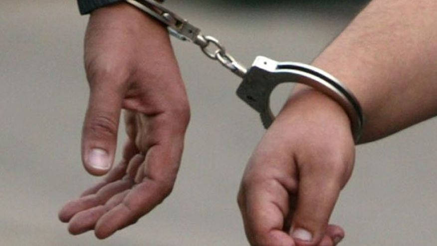 Two men held for snatching laptop, cell phones from foreigner