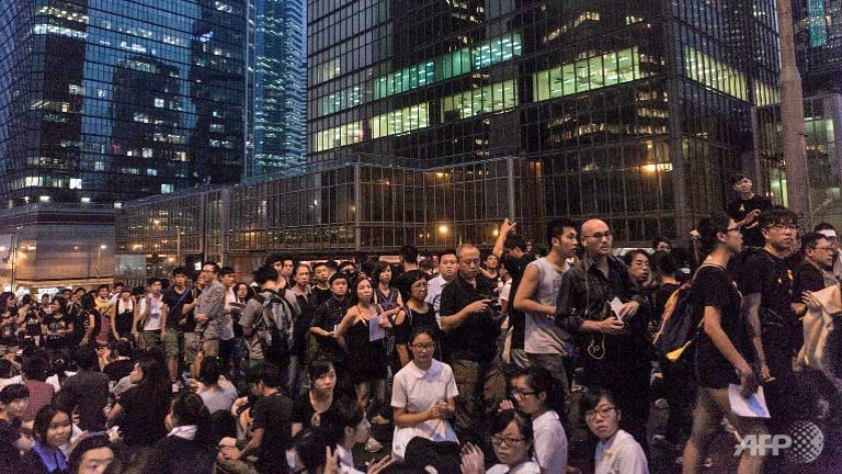 Defiant Hong Kong protesters demand leader steps down