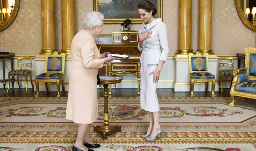 Britain's Queen Elizabeth makes actress Angelina Jolie a Dame