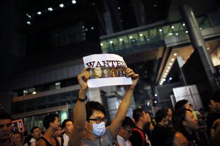 China asks foreign media to report Hong Kong unrest 