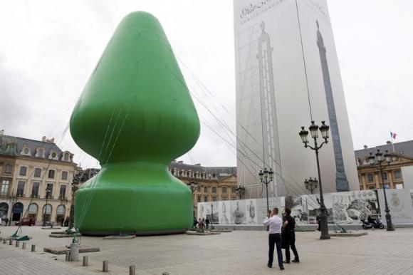 Vandals bring down sex toy shaped sculpture in Paris
