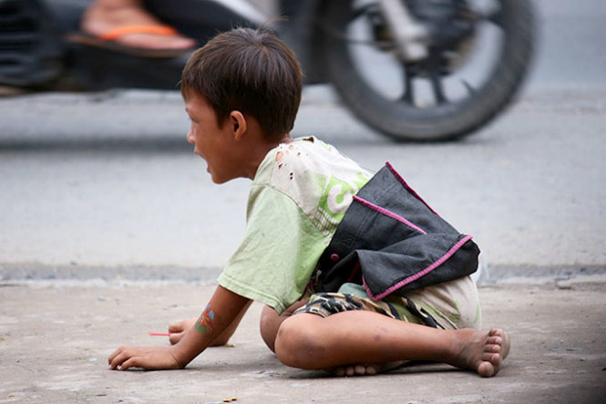 ​In photos: forced child beggars in Vietnam