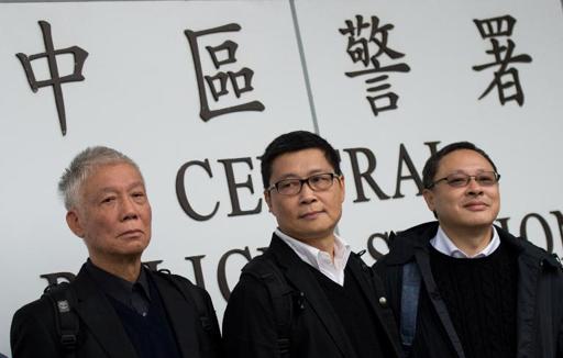 Hong Kong Occupy protest leaders turn themselves in to police