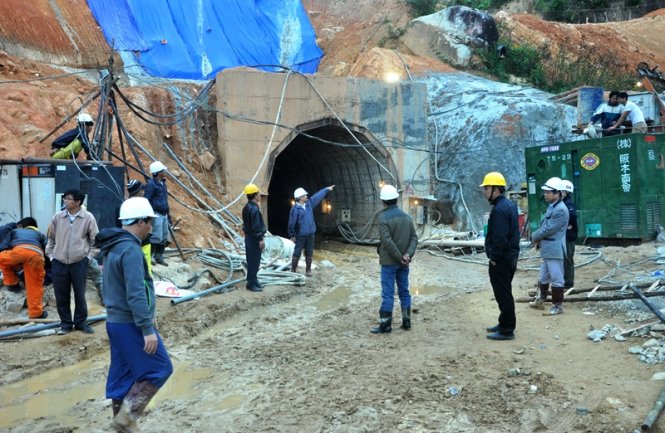Drilling creates wider access to 12 trapped Vietnamese workers in tunnel collapse