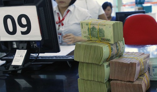Vietnam plans faster lending in 2015 to spur growth
