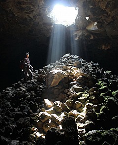 The bewitching beauty of C6 Cave, part of the newly discovered volcanic cave system in Krong No District in the Central Highlands province of Dak Nong. The cave has a section eating through to the surface, so sunlight beams can be seen in the dark cave.