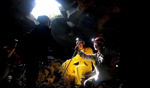 Dr. H. Tachihara (right) and T. Honda (middle)- two veteran experts of the Japan Caving Association expedition team. The two have explored volcanic caves in Hawaii, South Africa and elsewhere in the world.