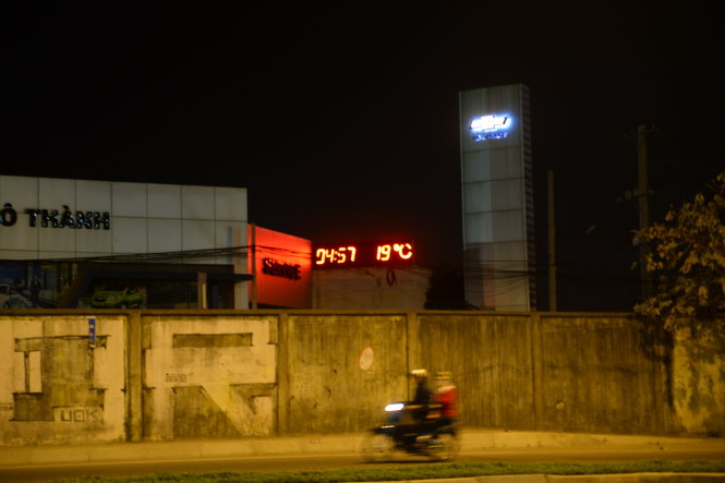 The temperature on early Friday morning is shown as 19 degrees Celsius at an information board on Nguyen Huu Canh street in Binh Thanh District.