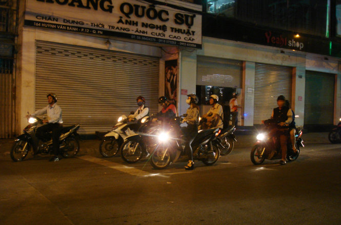 A motorcyclist is pictured trespassing the zebra crossing at 9.51 pm on January 25, 2015 while waiting at the red lights at District 3’s Huynh Van Banh- Tran Huy Lieu intersection. None of his fellow drivers followed suit.
